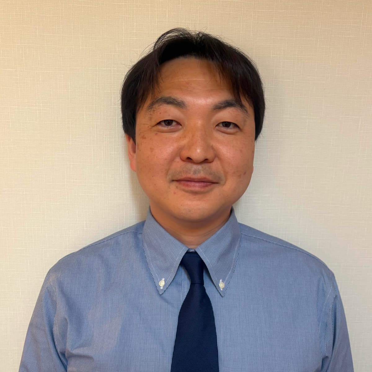 Yoshifumi Tomita (Sales Department Chief, Tokyo Plant)